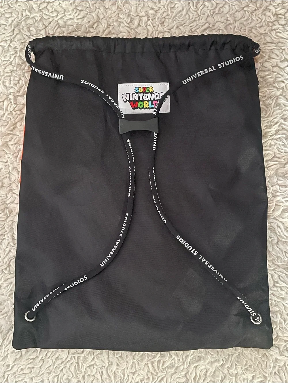 Universal Orange and Black Bowser Graphic Drawstring Backpack